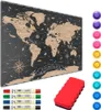 A scratch-off world map with accessories like markers, magnets, and an eraser, displayed on a white background. Anteprima dell’immagine prodotto