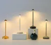 Four modern LED table lamps are displayed on a white surface against a light gray background. Produktbild-Vorschau