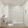 A modern bathroom with a walk-in shower, vanity, and decorative floor tiles. Produktbild-Vorschau