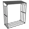 A black metal firewood rack with a roof, shown outdoors against a white background. Podgląd zdjęcia produktu