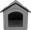 A gray fabric dog house with an arched entrance. Produktbild-Vorschau