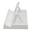 A white plastic stand for a handheld gaming device, shown from a side angle. Produktbild-Vorschau