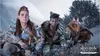 Three characters from the video game Horizon Forbidden West are shown sitting in a snowy, outdoor environment. Produktbild-Vorschau