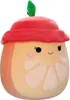 A plush toy shaped like an orange with a red hat and a green leaf on top. Podgląd zdjęcia produktu