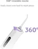 A close-up shot of a white water flosser with a purple arrow indicating rotation, and text highlighting its features. Produktbild-Vorschau