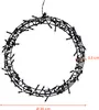 A circular LED wreath with white lights on a black frame, shown against a white background. Dimensions are indicated. Anteprima dell’immagine prodotto