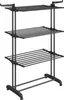A black, three-tiered drying rack with wheels. Produktbild-Vorschau