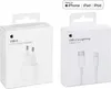 Two white boxes of Apple charging accessories are shown side-by-side against a white background. Náhled obrázku produktu