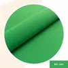 A rolled-up green fabric is shown inside a circle. Anteprima dell’immagine prodotto