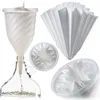 A set of wine filtering equipment, including a funnel, filter papers, and filter holders, arranged on a white background. Anteprima dell’immagine prodotto