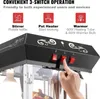 Close-up of the top part of a black popcorn machine, showing the control switches and decorative elements. A hand is pressing one of the red switches. Above the machine, there are diagrams and text explaining the "3-SWITCH OPERATION". Produktbild-Vorschau