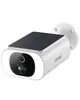 A white security camera with a solar panel on top, mounted on a white bracket. Produktbild-Vorschau