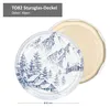 A lid with a mountain landscape design and a plain lid in the background. Anteprima dell’immagine prodotto