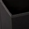 A close-up view of the corner of a dark fabric storage box. Náhled obrázku produktu