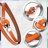 J&W Dámský kožený opasek Lushi černo-zlatá One size Náhled obrázku produktu 19