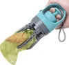 A hand holding a dog poop scooper with a bag attached. Produktbild-Vorschau
