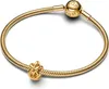 A gold-colored Pandora bracelet with a knot-shaped charm and a spherical clasp. Anteprima dell’immagine prodotto