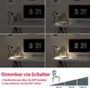 A collage of four images showing a desk lamp at different brightness levels, with text and a dimmer indicator at the bottom. Anteprima dell’immagine prodotto