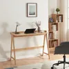 A modern home office setup with a wooden desk, laptop, lamp, and bookshelf. Podgląd zdjęcia produktu