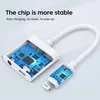 A white adapter cable with its internal circuitry exposed, connected to an iPhone charging cable. Produktbild-Vorschau