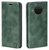 A green flip case for a smartphone is shown from two angles against a white background. Produktbild-Vorschau