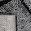 A close-up view of a rug, showing its texture and pattern. Anteprima dell’immagine prodotto
