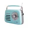 A mint-colored vintage-style radio with a silver dial and handle, shown against a white background. Náhled obrázku produktu
