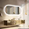 A modern bathroom vanity with a large oval LED mirror, sink, and faucet. Podgląd zdjęcia produktu