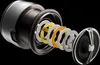 An exploded view of a fishing reel's internal components, showing the spool, drag washers, and other parts. Náhled obrázku produktu