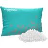 A teal pillow with gray triangle patterns and a pile of white beads next to it. Náhled obrázku produktu