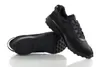 A pair of black Nike Waffle Debut sneakers are displayed on a white background. Náhled obrázku produktu