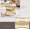 A close-up and a wider shot of a round coffee table with a marble-look top and a gold metal frame, featuring two tiers for storage. Text overlays describe the features. Náhľad obrázku produktu