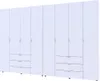 A white wardrobe with multiple doors and drawers. Náhled obrázku produktu