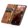 A brown flip-case wallet for a smartphone is shown open, displaying the phone's screen and the wallet's card slots. Produktbild-Vorschau
