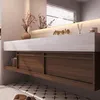 A modern bathroom vanity with a ceramic sink, wooden drawers, and a marble countertop. Anteprima dell’immagine prodotto