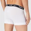A person wearing white Nike boxer briefs, shown from the back. Produktbild-Vorschau
