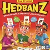 Three children playing a card game called Hedbanz, with cards on their heads. Anteprima dell’immagine prodotto