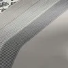 A close-up view of a striped pattern, likely wallpaper or fabric, with varying widths and colors of stripes. Produktbild-Vorschau