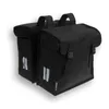 A black double pannier bag for a bicycle, shown from a three-quarter front view against a white background. Náhled obrázku produktu