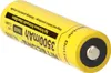 A close-up, angled shot of a yellow 18650 rechargeable lithium battery with black text and markings. Voir les images du produit
