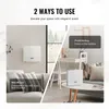 A collage showing two ways to use a white scent diffuser: wall-mounted in a living room and freestanding on a coffee table. Náhled obrázku produktu