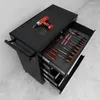 A tool cart with drawers open, displaying various tools and a drill on top. Náhled obrázku produktu