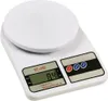 A white digital kitchen scale is shown from a slight angle. Náhľad obrázku produktu