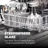 Inside a dishwasher, showing a basket of cutlery and wine glasses. Produktbild-Vorschau