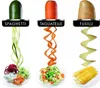 A product image showcasing a spiralizer attachment for a Magimix food processor, demonstrating different spiral cutting styles (spaghetti, tagliatelle, fusilli) with zucchini, carrots, and potatoes. Podgląd zdjęcia produktu