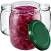 Three glass jars, one filled with red cabbage, and a green lid are arranged on a white background. Podgląd zdjęcia produktu