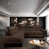 A modern living room with a sectional sofa against a stone wall. Podgląd zdjęcia produktu