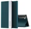 A teal flip case for a smartphone is shown, partially open, revealing the phone's camera array. Produktbild-Vorschau