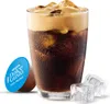 A glass of iced coffee with a Nescafé Dolce Gusto capsule and ice cubes. Produktbild-Vorschau