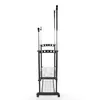 A side view of a black garment rack with silver poles and two wire shelves. Náhled obrázku produktu